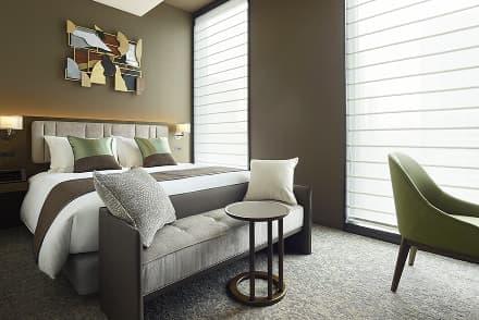 Luxury hotel room interior, showcasing the upscale stay experience available with the 50,000 yen Premium Gift Certificate.